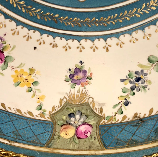 A French 19th Century Louis XVI St. Ormolu and Sèvres Porcelain Centerpiece.