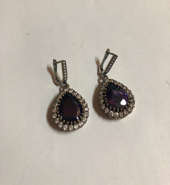 A 925 Silver pair of Earrings with Sapphire stones.