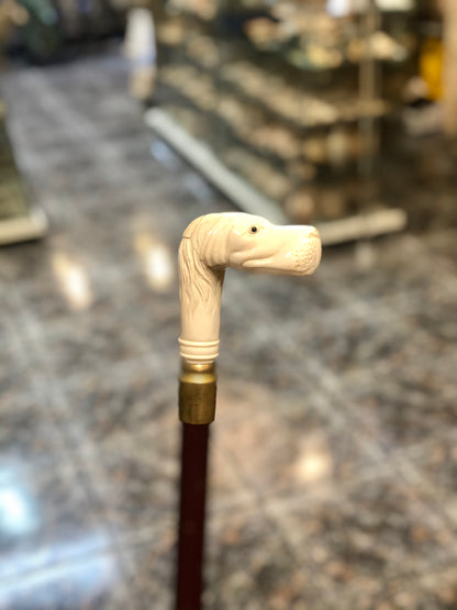 A handmade walking-stick, made out of pure Ivory.