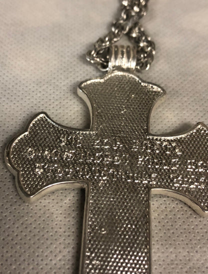 A 925 Silver Cross with silver chain.