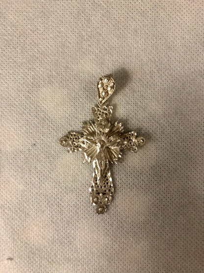 A 925 silver cross pendant.