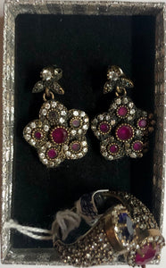A 925 silver set of a ring and earrings with Sapphire stones.