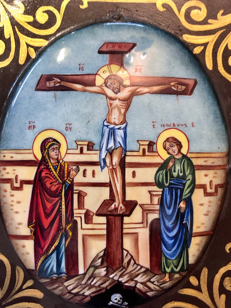 A Russian Enameled wood carved Icon of Jesus’ Crucifixion.