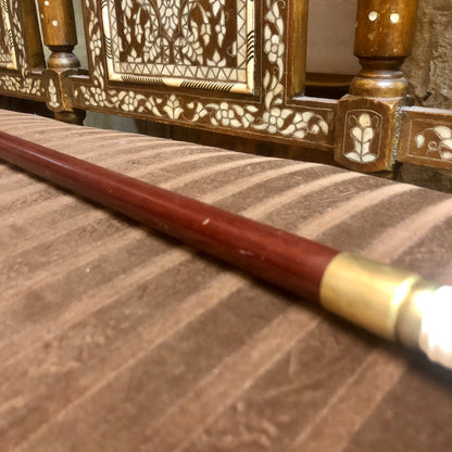 A handmade walking-stick, made out of pure Ivory.