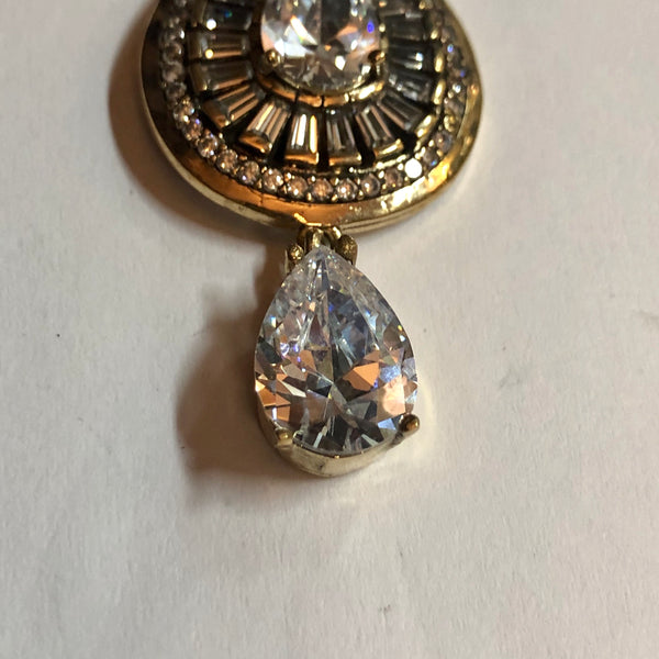 A 925 Silver Pendant with Sapphire stones.