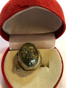 Roman Glass put on a silver ring 925.