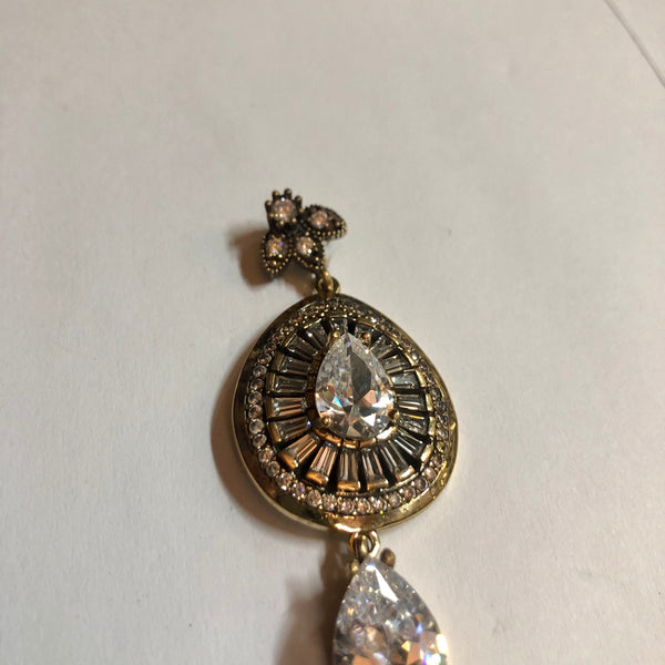 A 925 Silver Pendant with Sapphire stones.