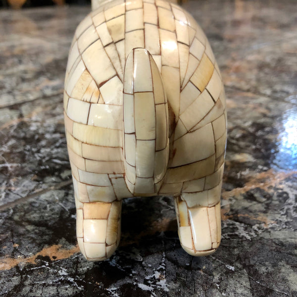 A dog made out of pure Ivory.