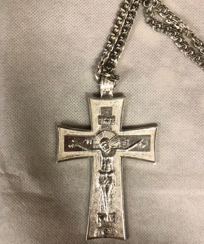 A 925 Silver cross with silver chain.