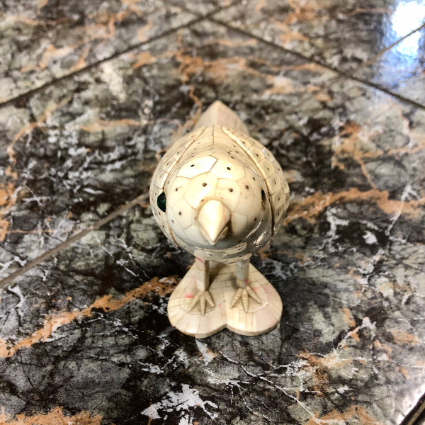 A Bird made out of pure Ivory. 80 years old.