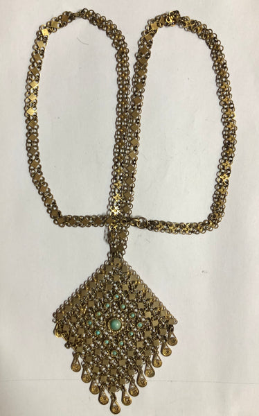A silver-gold plated necklace, antique silver with Turquoise stones.