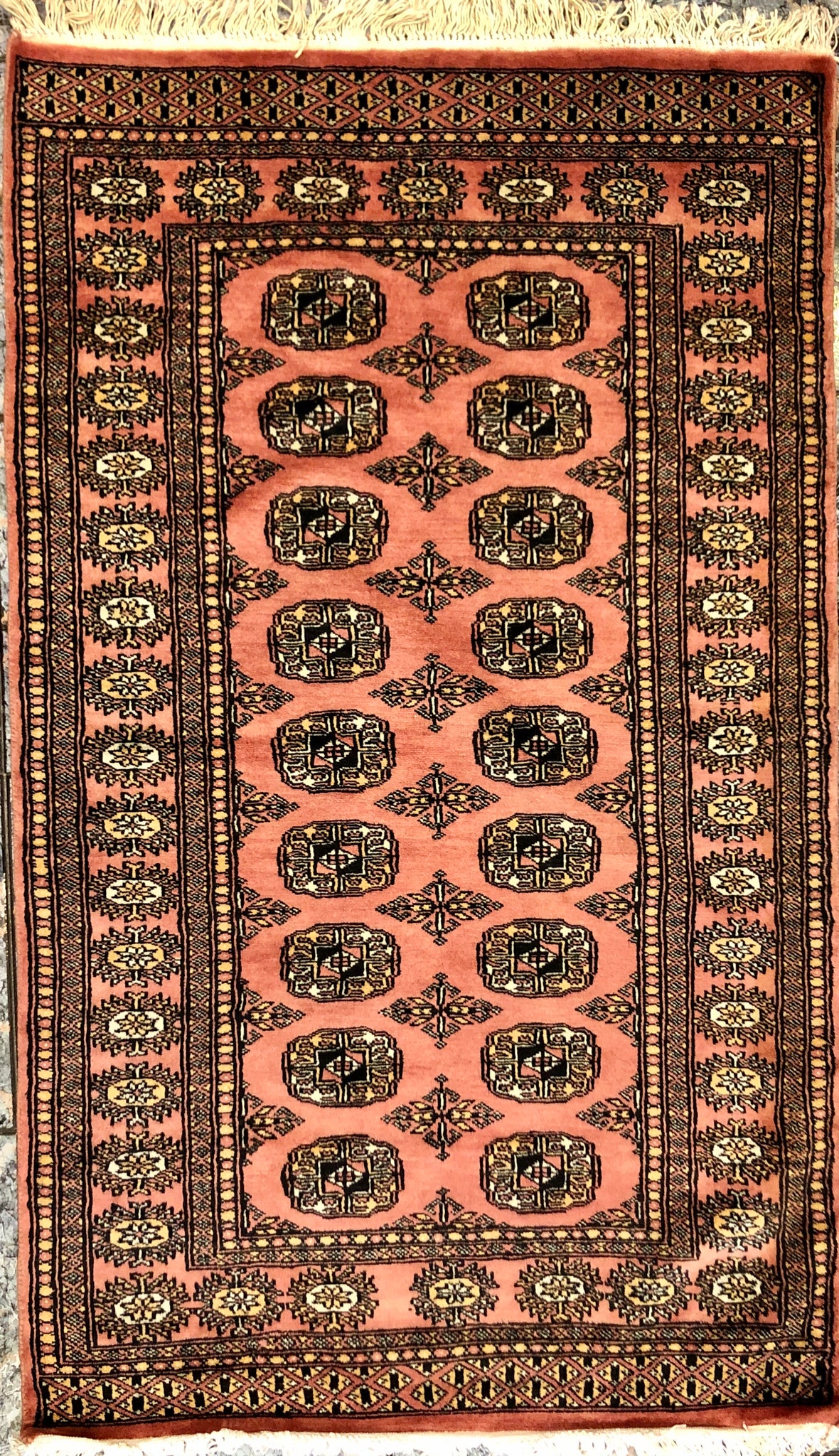 A Handmade Pakistani Wool Carpet.