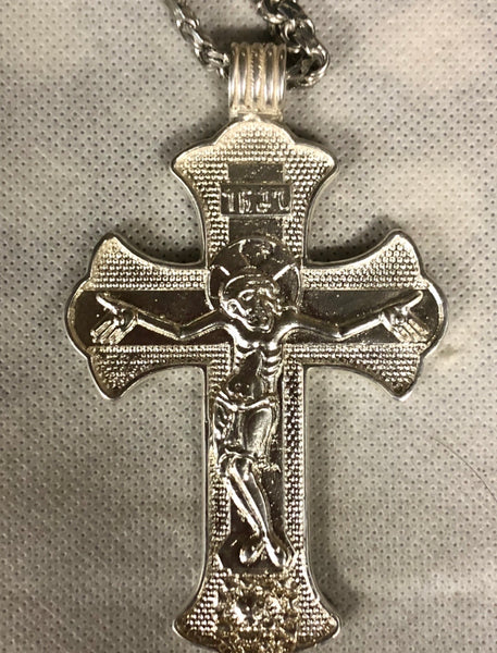 A 925 Silver Cross with silver chain.