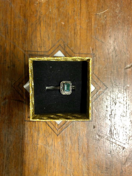 A Golden Ring with Emeralds Stones and Diamonds. 8K