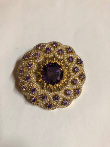 A 925 Silver Brooch with Sapphire stones.