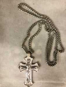A 925 Silver Cross with silver chain.