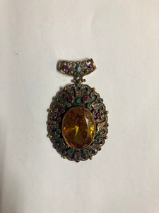A 925 Silver Pendant with Sapphire stones.