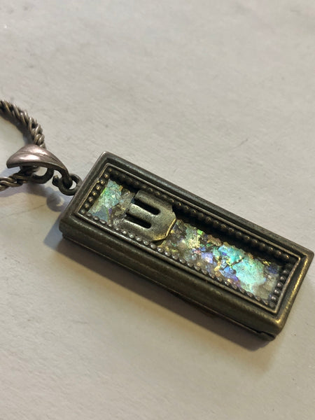 Roman Glass put in antique silver frame pendant. Antique silver 925.