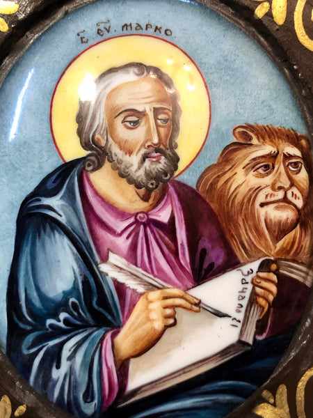 A Russian Enameled icon of St. Mark The Evangelist, wood carved.